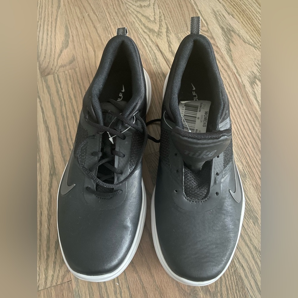 Nike women’s golfing shoes. Size 7, never worn.
